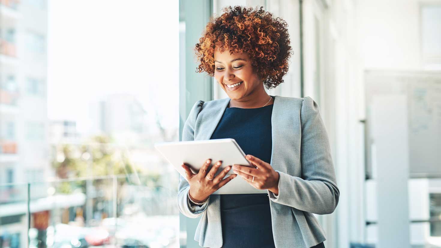 Shot of a young businesswoman using a digital tablet in an office
