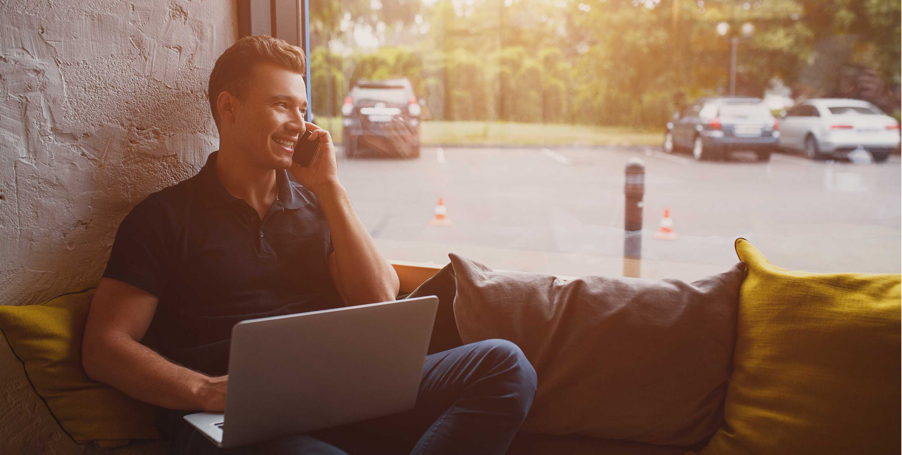 Employee on the phone getting work done in the office