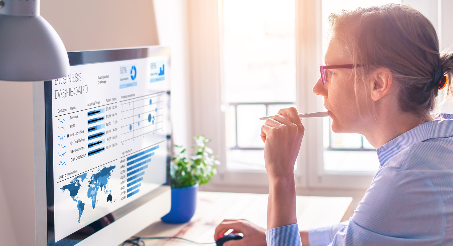 Women analyzing Business Dashboards