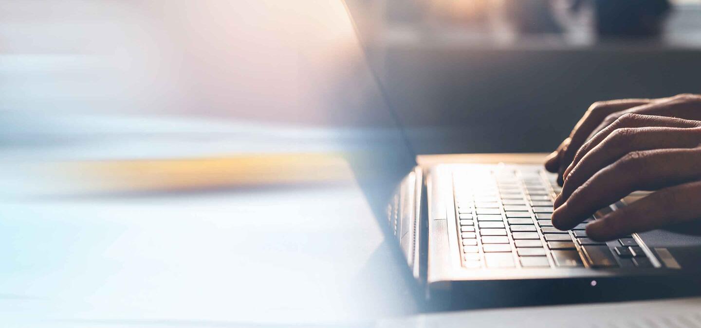 Businessman working on laptop. Panoramic business banner