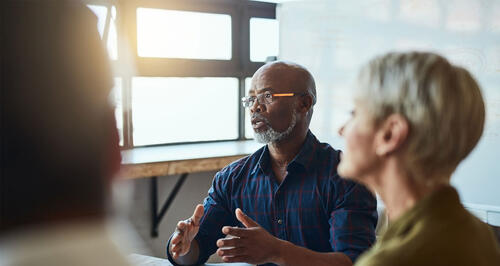 Group of people talking in office 