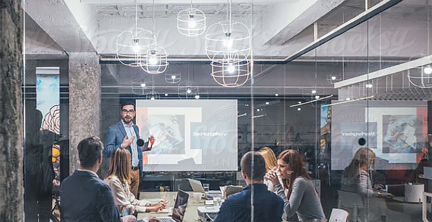 Man giving a presentation to a group of people