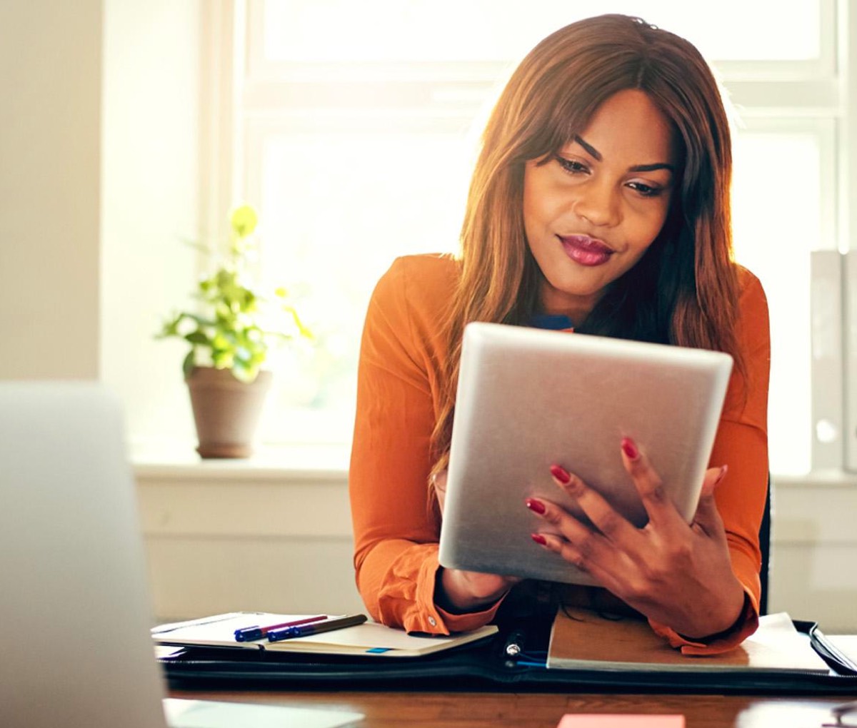 Woman looking at a tablet